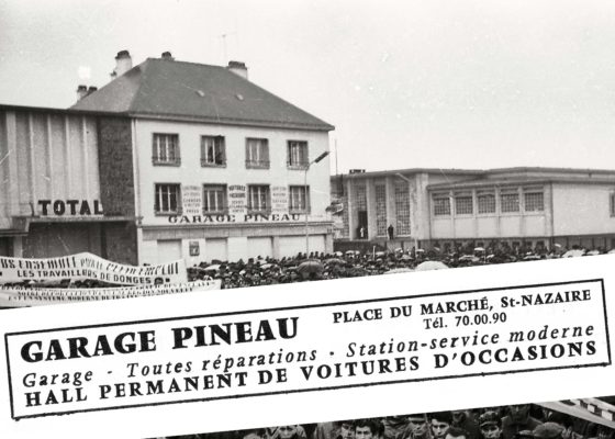 Garage Pineau dans le centre-ville. Au fond, le tribunal de Saint-Nazaire.