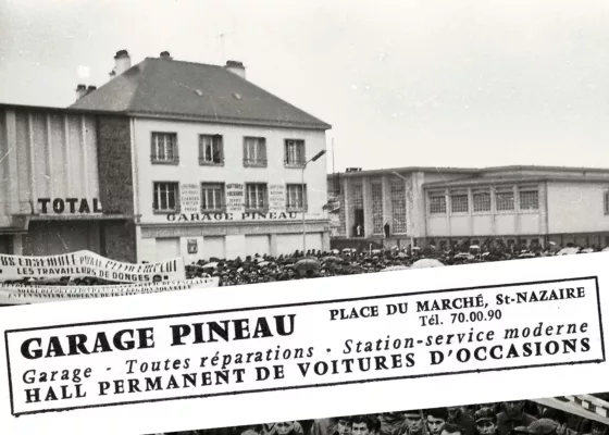 Garage Pineau dans le centre-ville. Au fond, le tribunal de Saint-Nazaire.