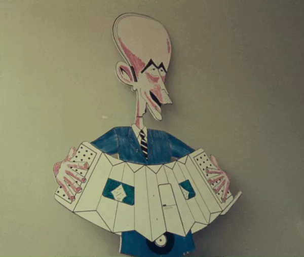 Caricature du président de la République Valéry Giscard d'Estaing jouant de l'accordéon.